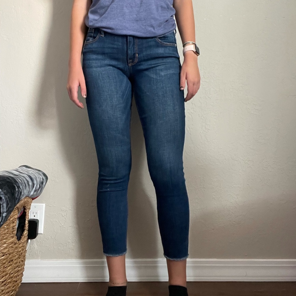 Capri jeans, distressed ankles